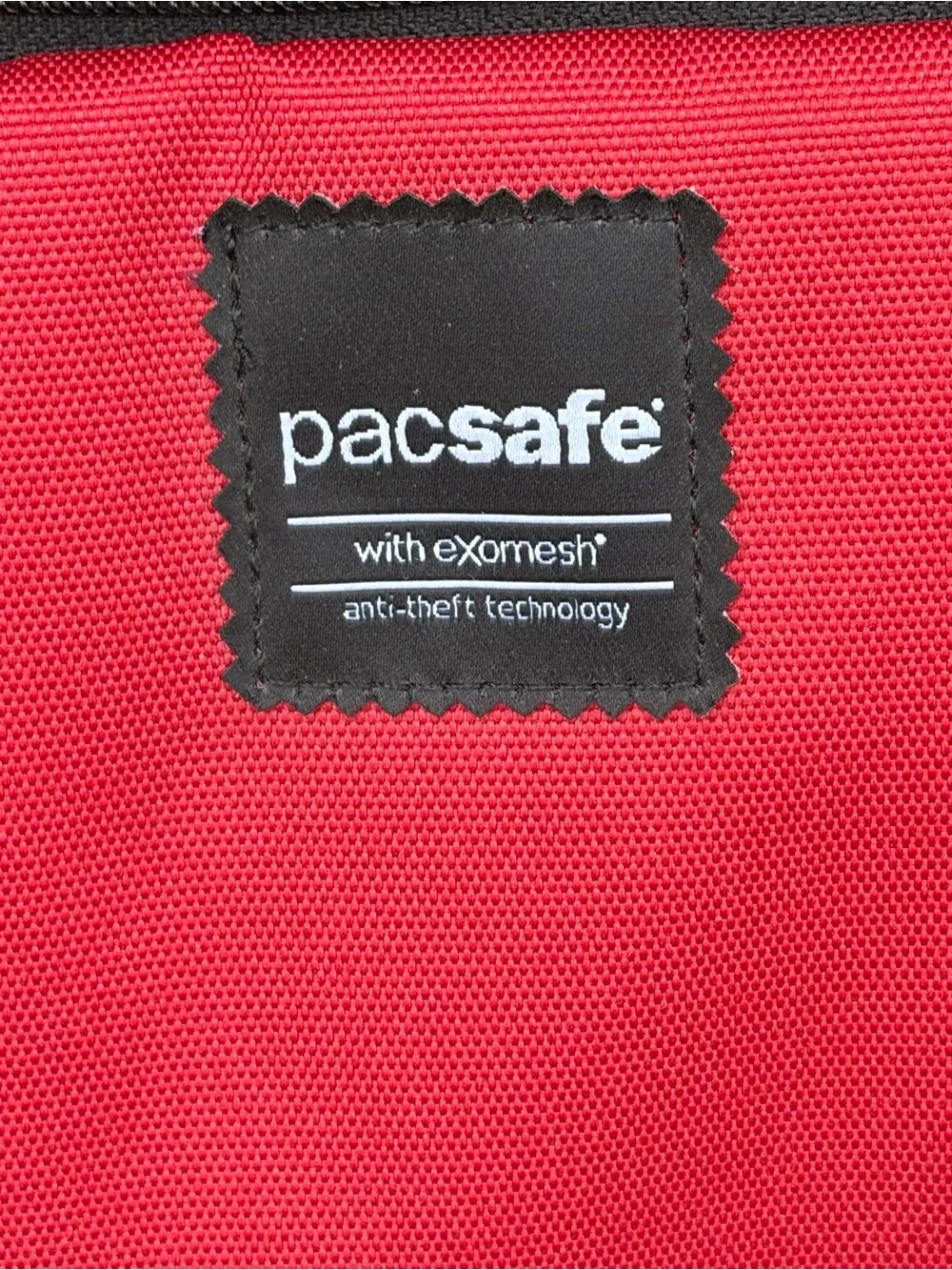 Pacsafe Red Slingsafe LX-series Anti-Theft Tote with Grey Strap Accents - Picture 2 of 5